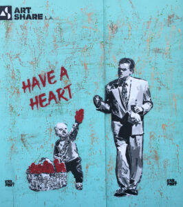 Street art on a boarded up storeront with a child handing hearts to a man walking by with the words "HAVE A HEART"