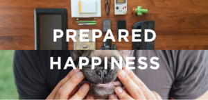 "Prepared Happiness" - A photo design from Metajive's website featuring a table of tech gadgets and a dog being held by its owner.